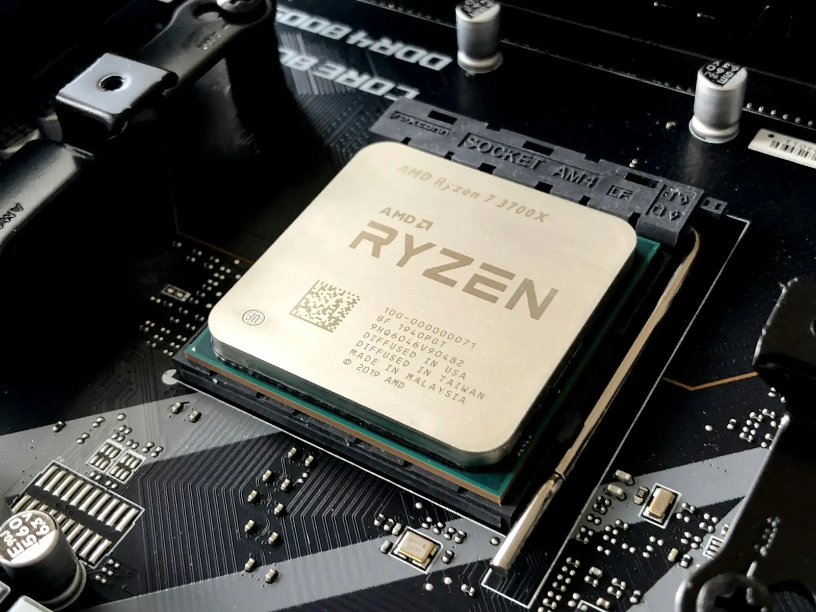 Processor seated on a computer motherboard among supporting components