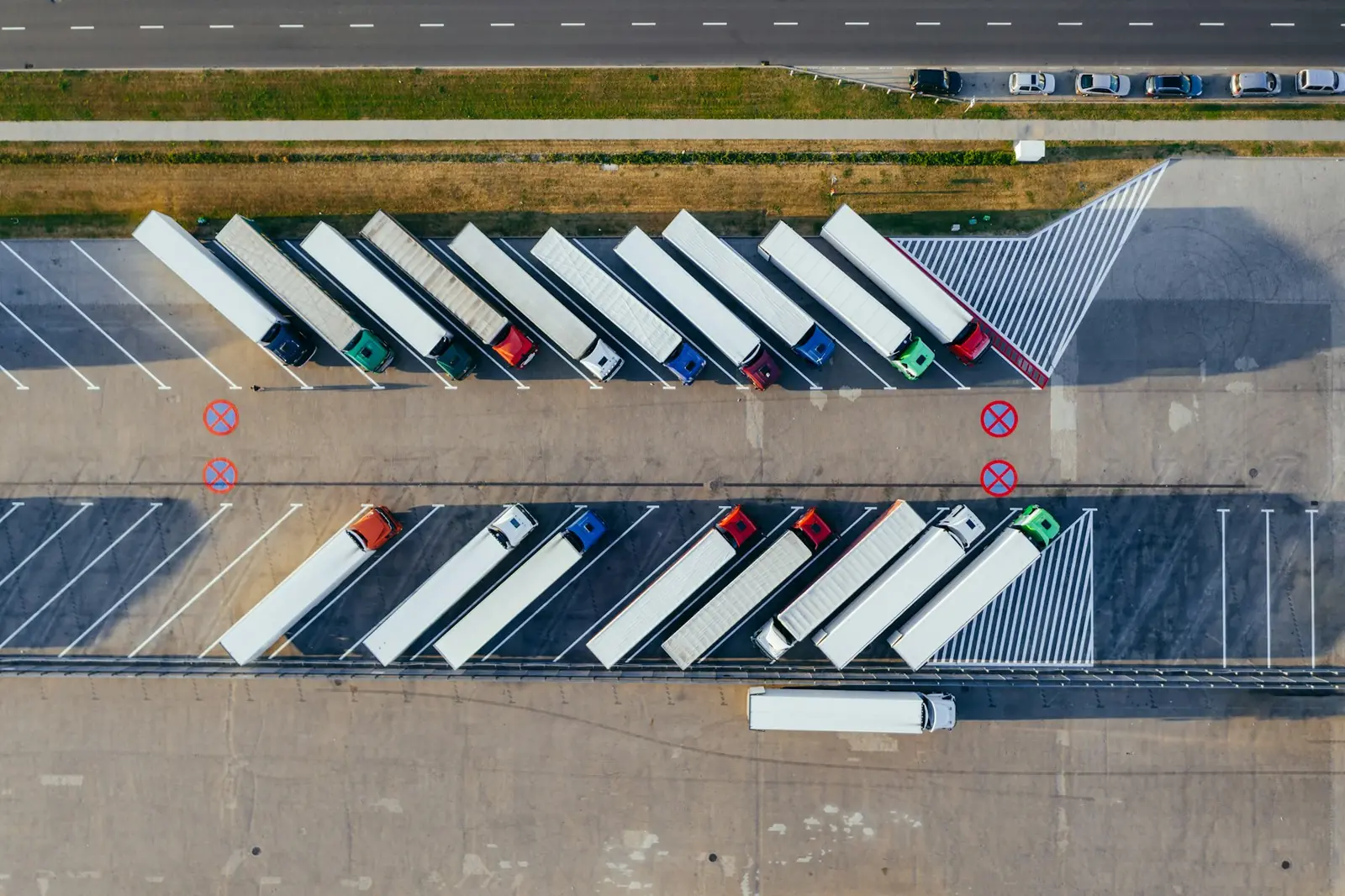 Aerial view of distribution vehicles at a logistics facility