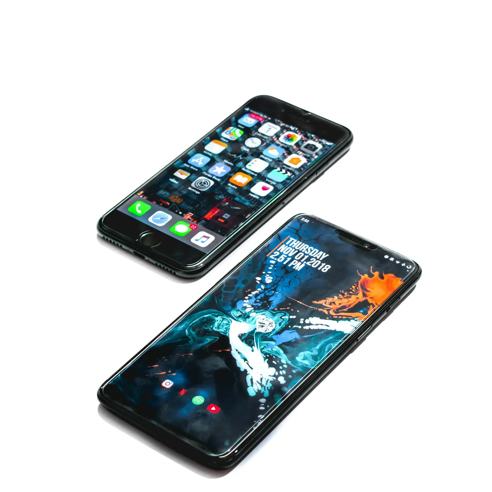 Two enterprise smartphones photographed against a plain background