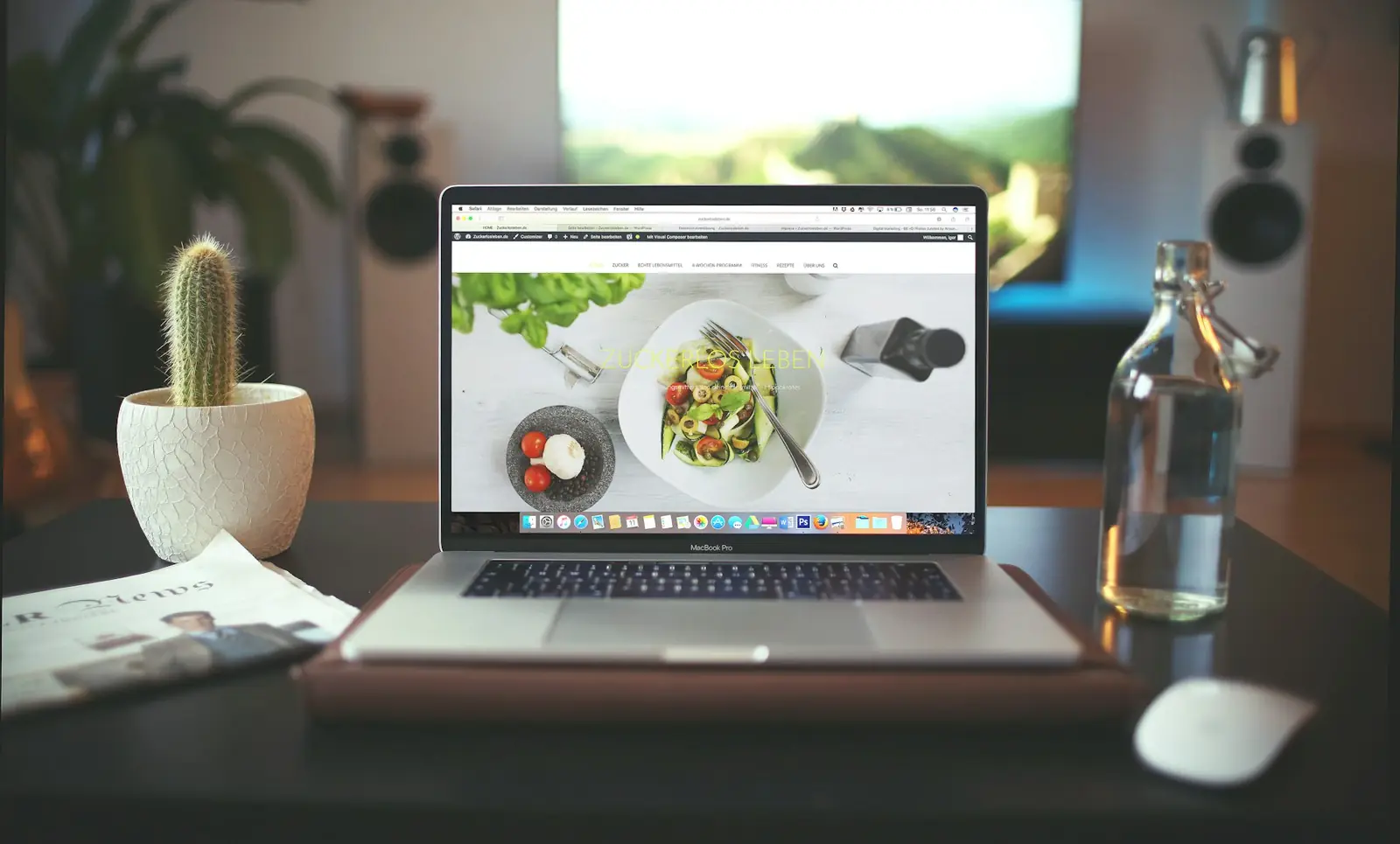 Online store product page displayed on a laptop in a workspace