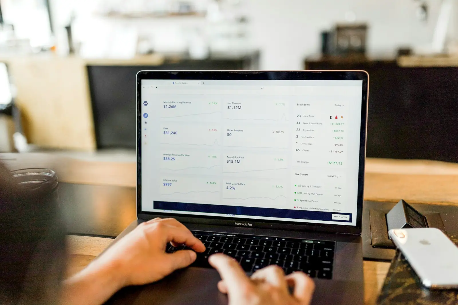 Email campaign interface open on a laptop at a working desk